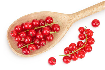 Red currant berries in a wooden spoon isolated on white background. Top view. Flat lay