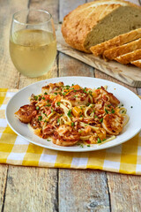 seared scallops over garlic pasta