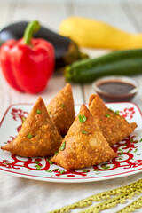 Veggie samosas stuffed with eggplant, zucchini, and summer squash