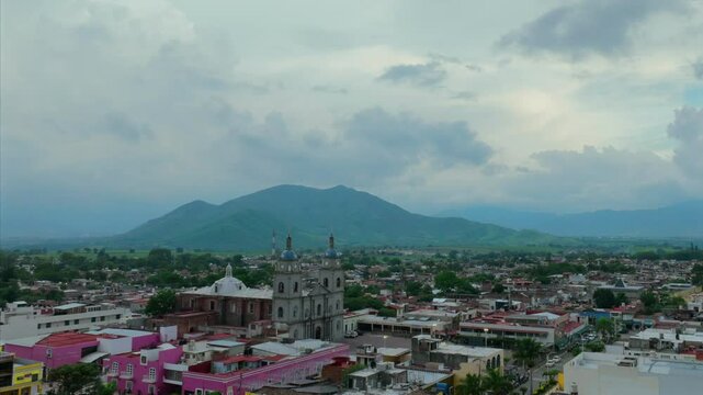 timelapse of Tuxpan cityscape from above with the temple of San Juan Bautista in Jalisco, Mexico