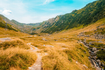 Fagaras mountains with Transfagarasan serpentine road in Sibiu County, Romania. Tansfaragasan road in the carpathian mountains. Top view