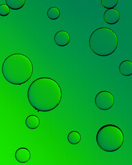 Macro close up of water bubbles with copy space on green background