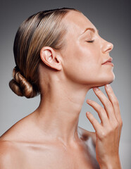 Profile, relax and skincare of mature woman in studio for glow, results and facial health on gray...