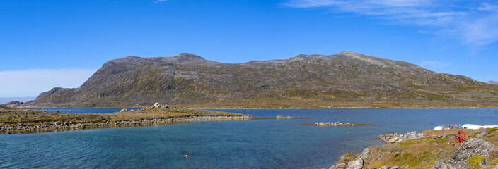 Scenic landscape view of the coast around the small remote town of Nanortalik in southern Greenland © Cerib
