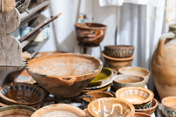 Vintage clay dishes are in a tourist shop in Kas, Turkey