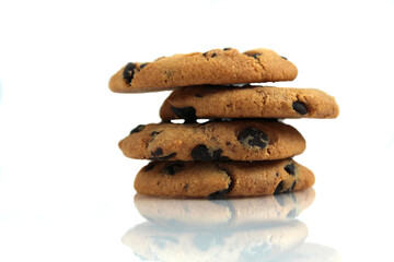 Chocolate Chip Cookies stacked on a white background with space for copyspace text. Chocolate Biscuit Isolate