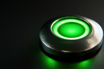Green Power Button - Symbol of Urgency and Control Isolated on Black Background