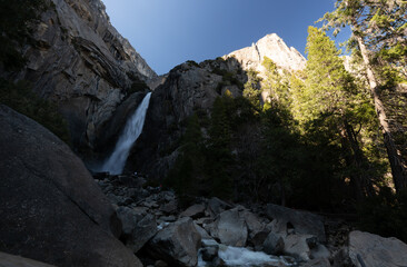 Sunny view of the Lower Yosemite Falls in Yosemite National Park