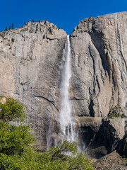 Sunny view of the Upper Yosemite Falls in Yosemite National Park