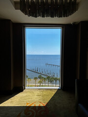 A view of the beach shore from a window