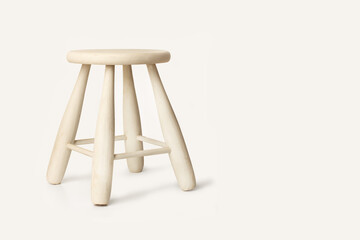 A white wooden small stool on a white background with copy space