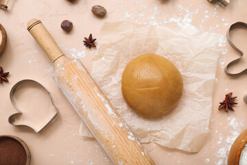 Composition with raw dough, spices and utensils for preparing Christmas cookies on color background