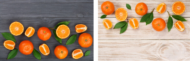 tangerine with leaves on black and white wooden background with copy space for your text. Flat lay, top view. Fruit composition