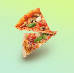 Pizza slices in air on green gradient background