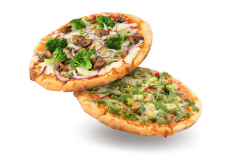 Different pizzas in air on white background