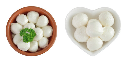 Mini mozzarella balls with parsley in a ceramic bowl isolated on white background. Top view. Flat lay.