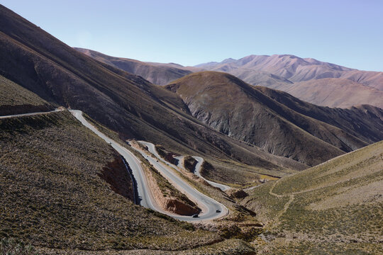 Majestic scenery with a winding scenic route in the mountains called Cuesta de Lipan or National Route 52, that connects Purmamarca with Salinas Grandes in Jujuy province, Puna, Argentina