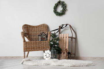 Interior of living room with armchair, Christmas lantern and fir tree