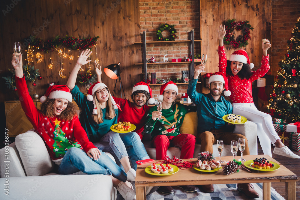 Canvas Prints Full body photo of cheerful young people friends group eat snacks have fun celebrate cozy christmas party decor spacious apartment indoors