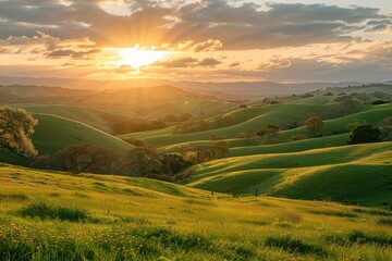 Fototapeta premium A breathtaking sunset over rolling hills with vibrant clouds and golden sunlight illuminating the landscape in the late afternoon