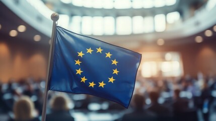 European Union flag in a large conference hall with delegates attending a meeting. Flag of the European Union on a blurred background.