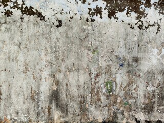 Texture of old concrete wall.Concrete wall of light grey color cement texture background.Grey pastel rough crack cement texture stone concrete,rock plastered stucco wall; painted flat fade background.