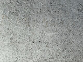 Texture of old concrete wall.Concrete wall of light grey color cement texture background.Grey pastel rough crack cement texture stone concrete,rock plastered stucco wall; painted flat fade background.