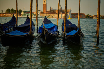 Fototapeta premium Venice and its canals,gondolas and ancient buildings 
