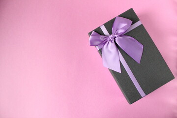 Gift Box Black on Green Black Blue Red Pink Background with Space for Copy Space Text