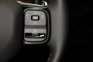 The modern cars steering wheel control panel boosts convenience and performance