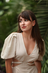 Naklejka premium Portrait of beautiful woman in tropical forest