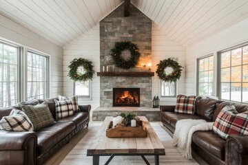 Cozy living room with holiday decor featuring a stone fireplace and rustic furnishings in a mountain cabin