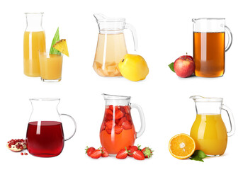 Glass jugs with different juices isolated on white, set