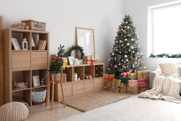 Interior of light living room with Christmas tree, shelf units and presents