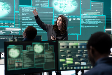 Cyber security specialist conducting cyber surveillance and threat detection in a governmental...