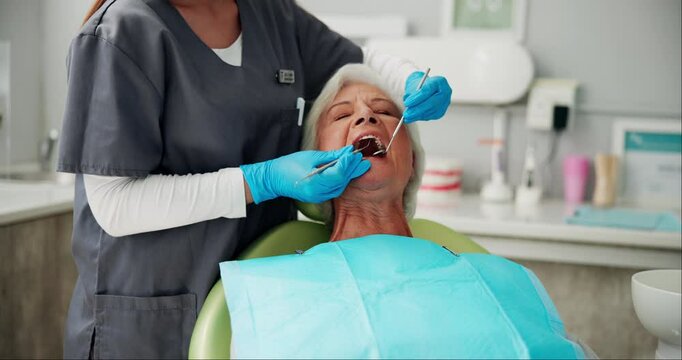 Elderly woman, dentist and dental for exam, healthcare and medical cleaning in hospital with excavator. Senior person, surgeon and oral tools for teeth whitening, root canal and implants with veneers
