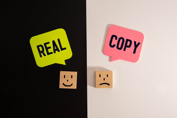 Real or fake symbol. Concept word Real or Fake on beautiful signpost with two arrows