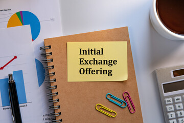 There is sticky note with the word Initial Exchange Offering. It is as an eye-catching image.