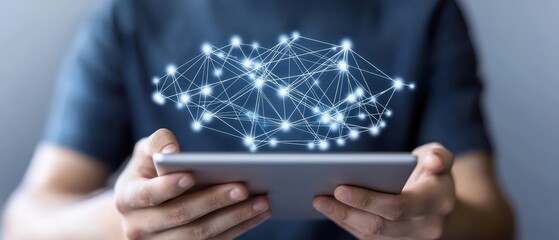 Innovative digital network concept with hands holding a tablet displaying interconnected nodes.