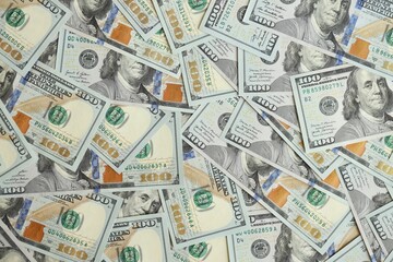 Big amount of american USD hunderd dollar bills banknotes close up