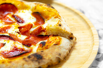 Classic rustic artisanal pizza with long-maturing dough