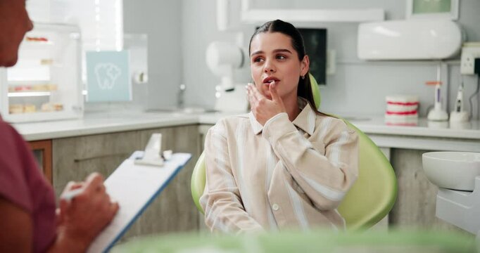 Toothache, consulting and pain with woman at dentist for cleaning, oral hygiene and checkup. Cavity, dental and healthcare advice with people at clinic for orthodontist, tmj treatment and exam