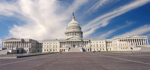 Panoramic view of US Capitol in Washington DC with blue sky background, USA