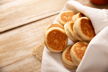 Gorditas de Nata. Cream Gorditas, Mexican street snack, is an easy recipe made with wheat flour, cream, sugar and cinnamon, sweet bread similar in shape to an English muffin, eaten as a dessert.