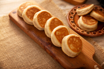 Gorditas de Nata. Cream Gorditas, Mexican street snack, is an easy recipe made with wheat flour, cream, sugar and cinnamon, sweet bread similar in shape to an English muffin, eaten as a dessert.