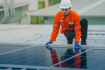 engineer man inspects construction of solar cell panel or photovoltaic cell by electronic device....