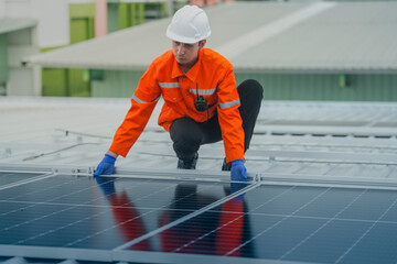 engineer man inspects construction of solar cell panel or photovoltaic cell by electronic device....
