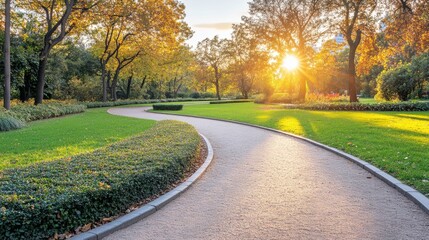 Fototapeta premium Winding Path in Autumn Park with Golden Sunlight