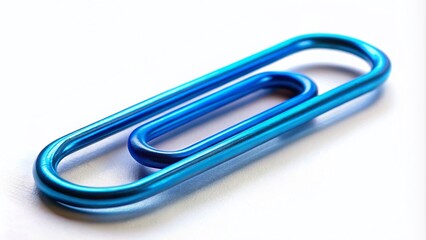 Blue Paperclip Isolated on White Background - Creative Office Supplies Photography