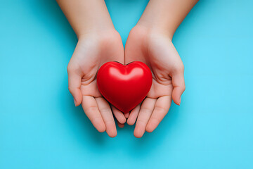 Family hands holding red heart, heart health insurance, charity volunteer donation, CSR responsibility, world heart day, world health day, family day, adoption foster care home, compliment concept
